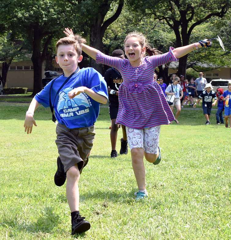 children run outside to participate in an activity be2a7f